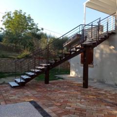 Scala esterna a rampa in acciaio per giardino